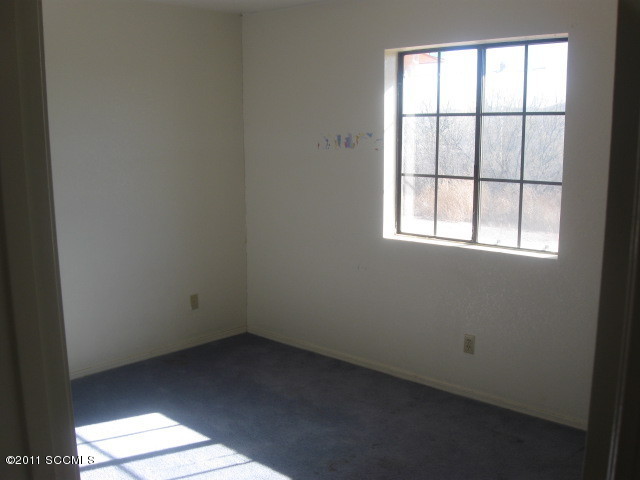 362 Annette Court Rio Rico, AZ 85648 - Photo 7 of 8 an empty room with a window