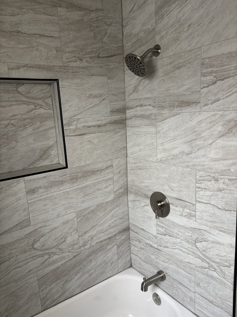 8052 South Aberdeen Street, Unit 3 Chicago, IL 60620 - Photo 4 of 6 a bathroom with a shower