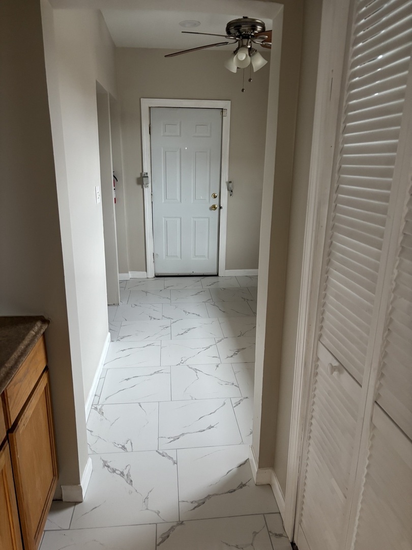 8052 South Aberdeen Street, Unit 3 Chicago, IL 60620 - Photo 6 of 6 wooden floor in a gallery