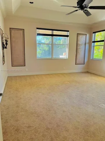 a bathroom with a tub a sink and a mirror