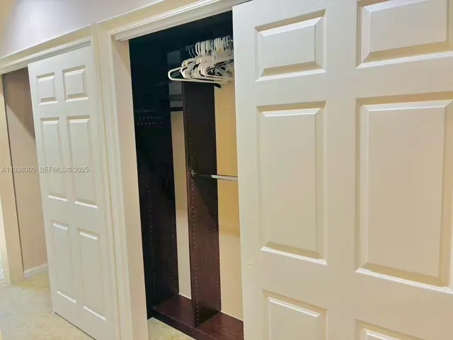 a bathroom with a shower and a toilet