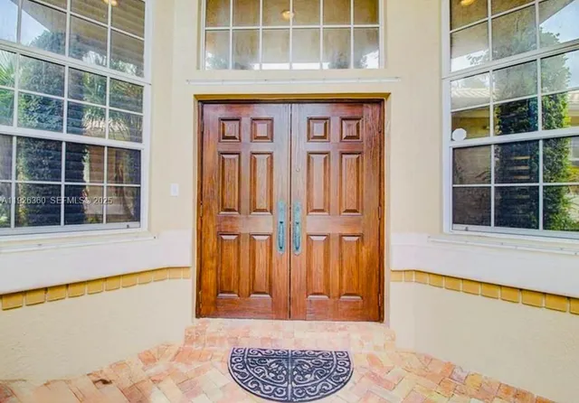 a view of front door of house and front door