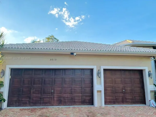 a view of a kitchen with a sink and dishwasher