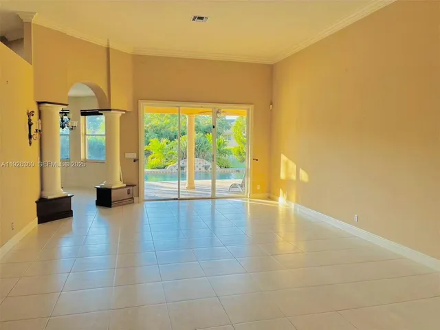 a blue painted wall with a window