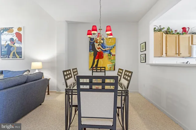 a bathroom with a sink a toilet and shower curtain