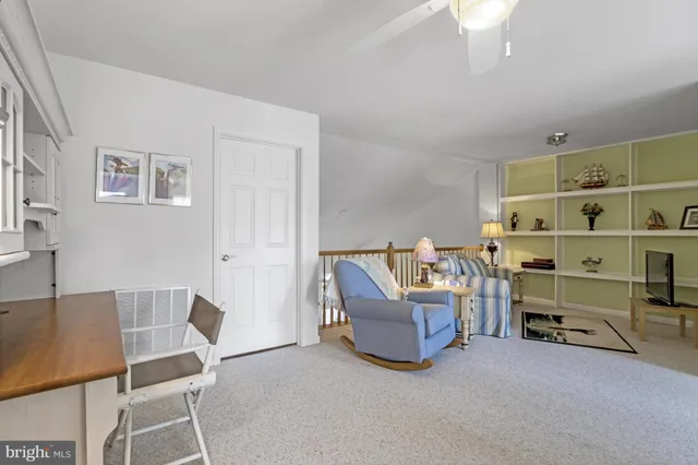 an aerial view of a house with a garden