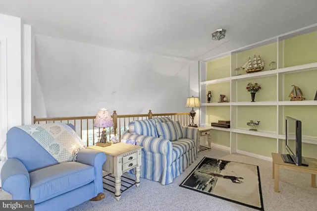 a picture of a bathroom with a shower and a mirror