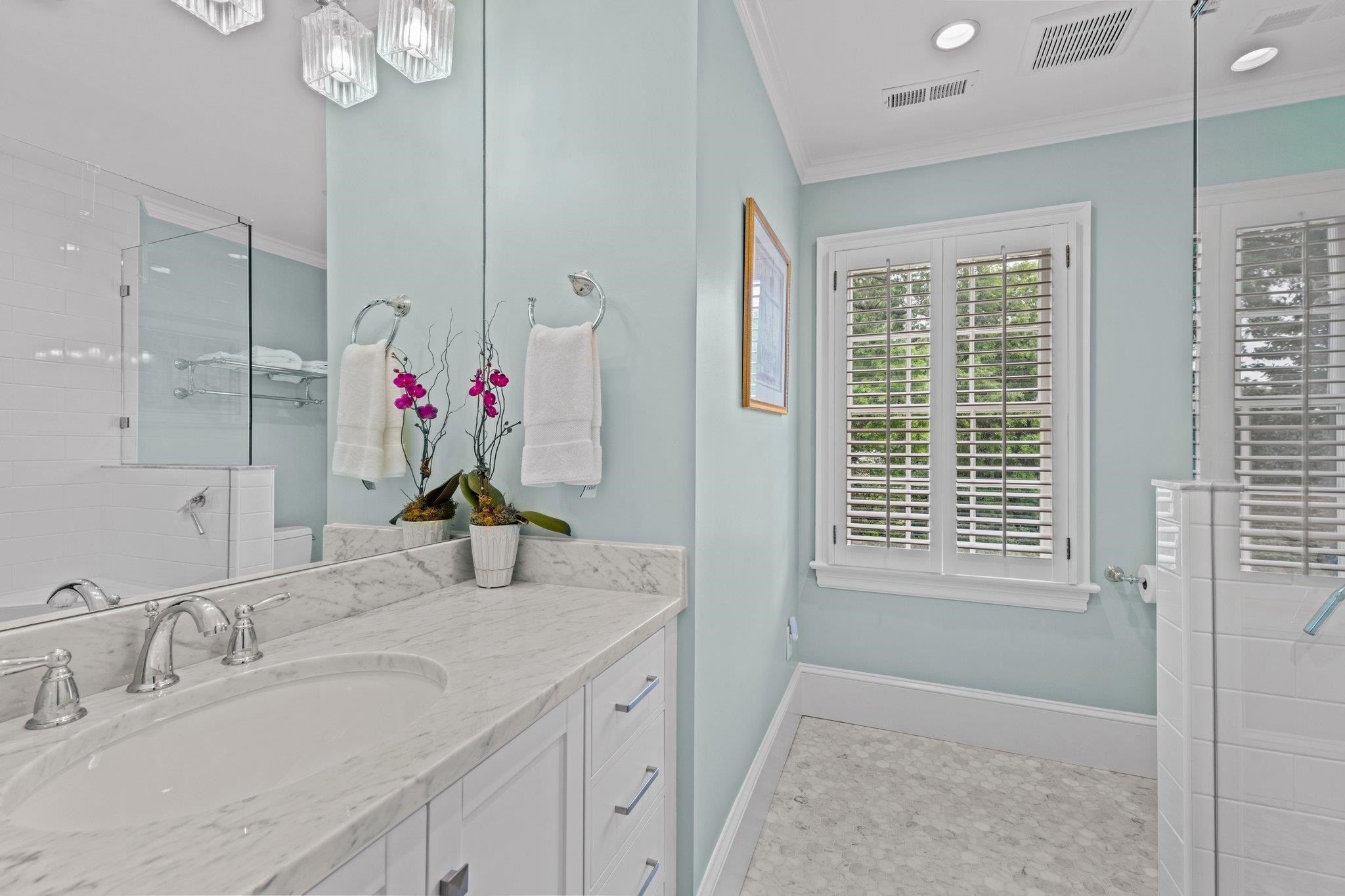 2217 St Marys Street Raleigh, NC 27608 - Photo 32 of 52 Beautifully renovated hallway bath on upper level with walk-in shower. Upstairs Full Bathroom