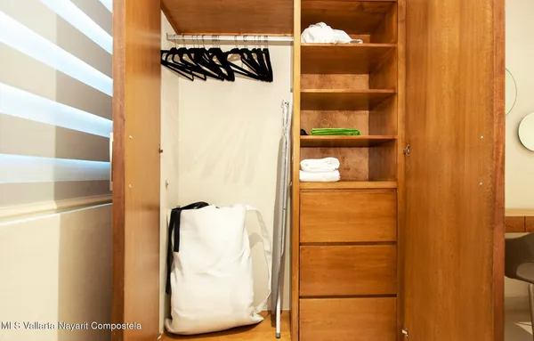 a view of a dining area with closet