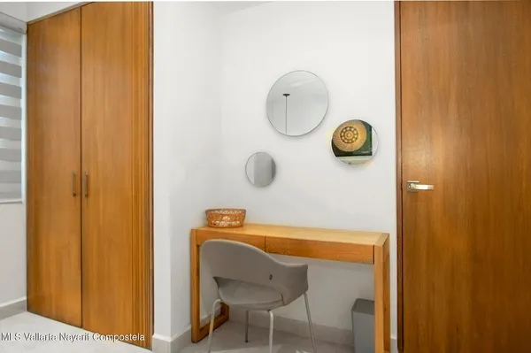 a bathroom with a toilet a sink and shower