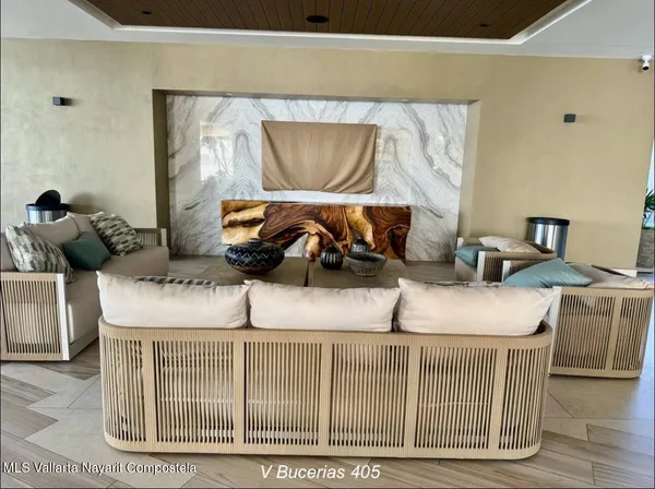 a hallway with hardwood floor and door