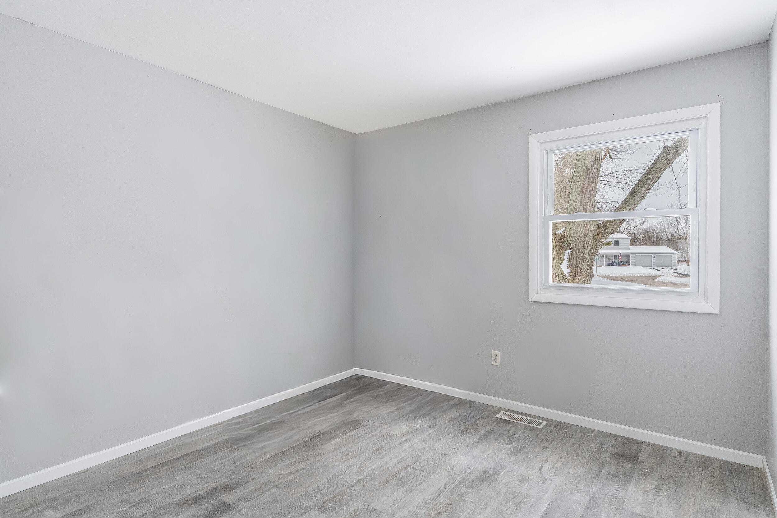419 Portland Road Valparaiso, IN 46385 - Photo 18 of 21 an empty room with a window
