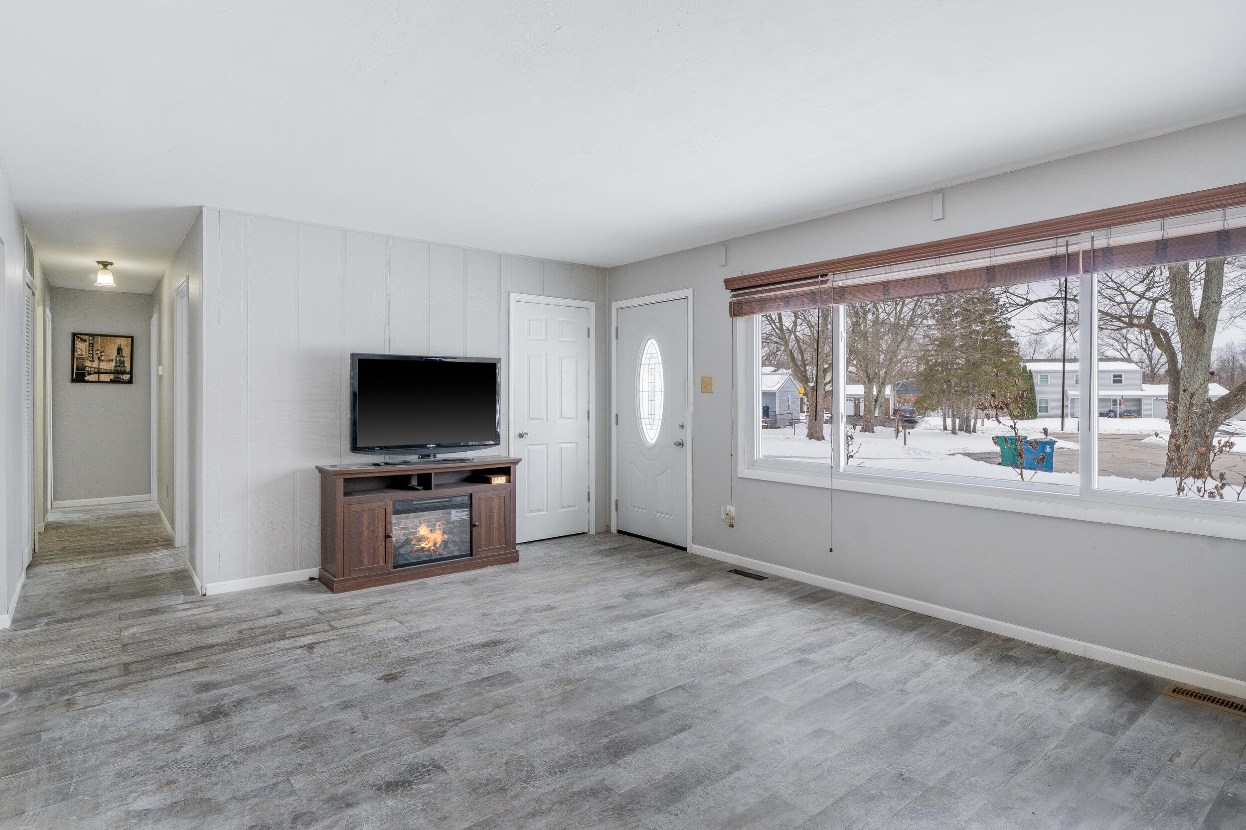 419 Portland Road Valparaiso, IN 46385 - Photo 6 of 21 an empty room with furniture and windows