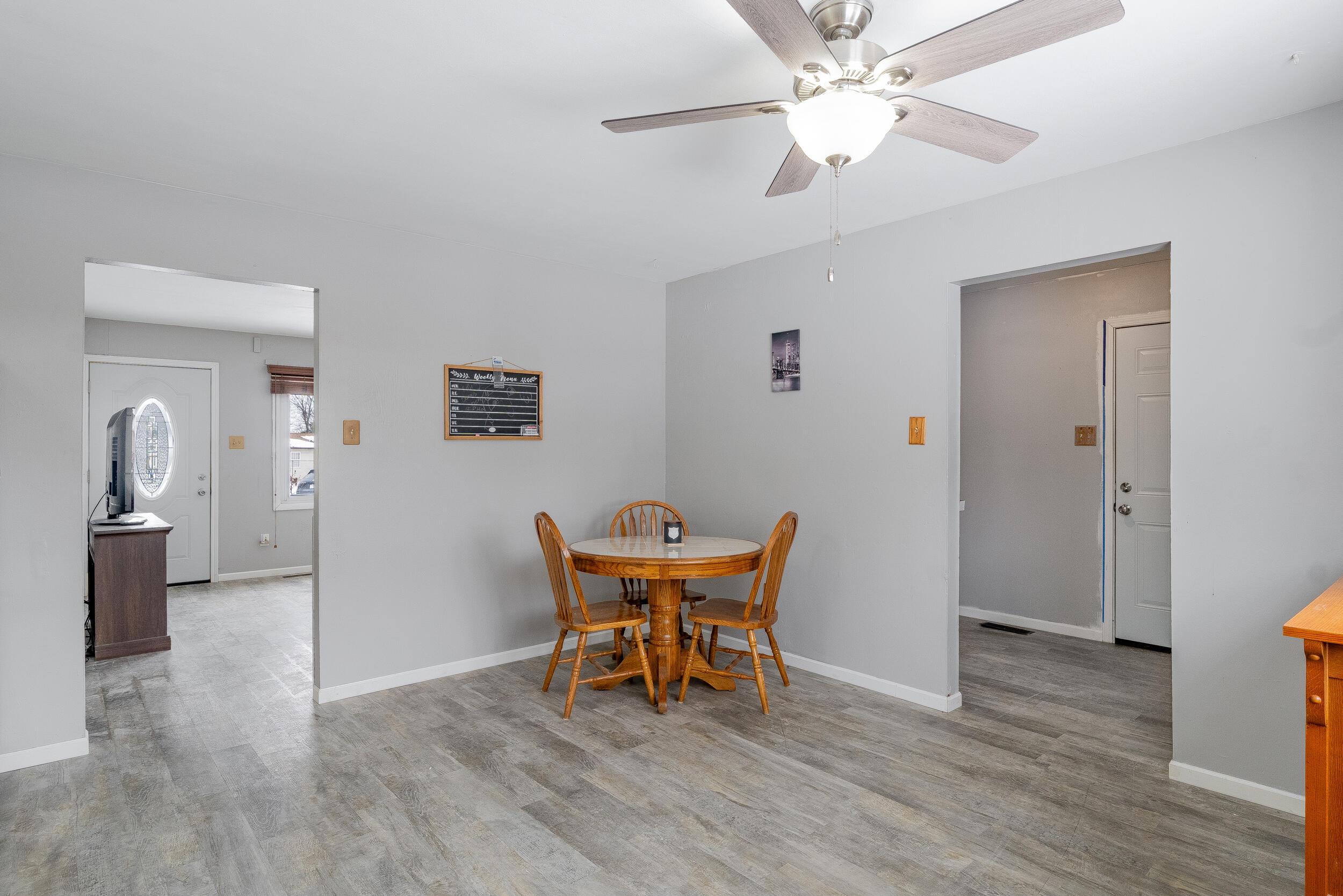 419 Portland Road Valparaiso, IN 46385 - Photo 8 of 21 a dining room with furniture and chandelier