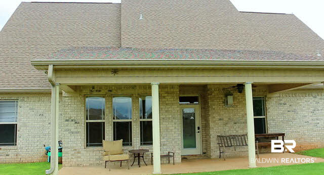 7020 Rocky Rd Loop Gulf Shores, AL 36542 - Photo 21 of 29 Covered back patio overlooks the private, fenced yard.
