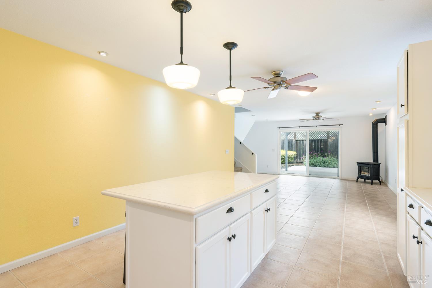 349 Sugar Maple Lane Windsor, CA 95492 - Photo 19 of 47 a view of a kitchen with a sink and a chandelier
