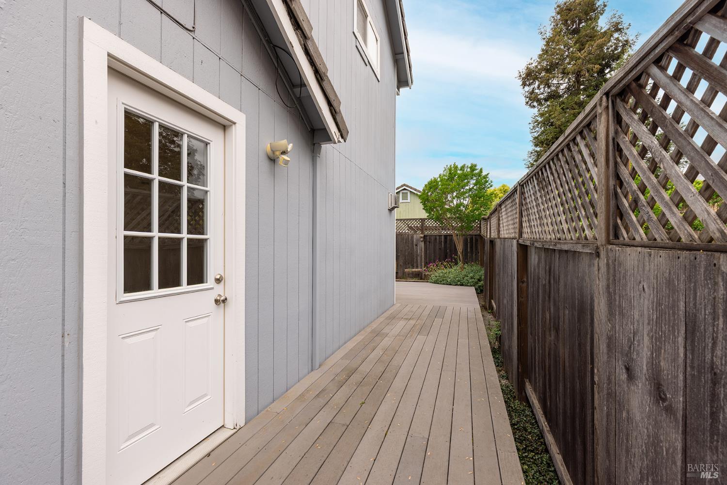 349 Sugar Maple Lane Windsor, CA 95492 - Photo 36 of 47 a view of balcony with wooden floor and fence
