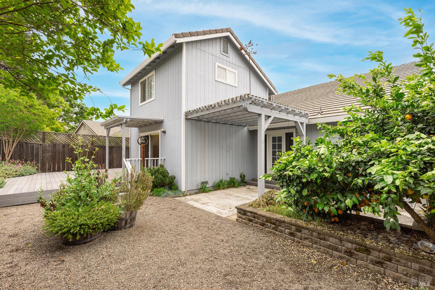 349 Sugar Maple Lane Windsor, CA 95492 - Photo 39 of 47 a front view of a house with garden