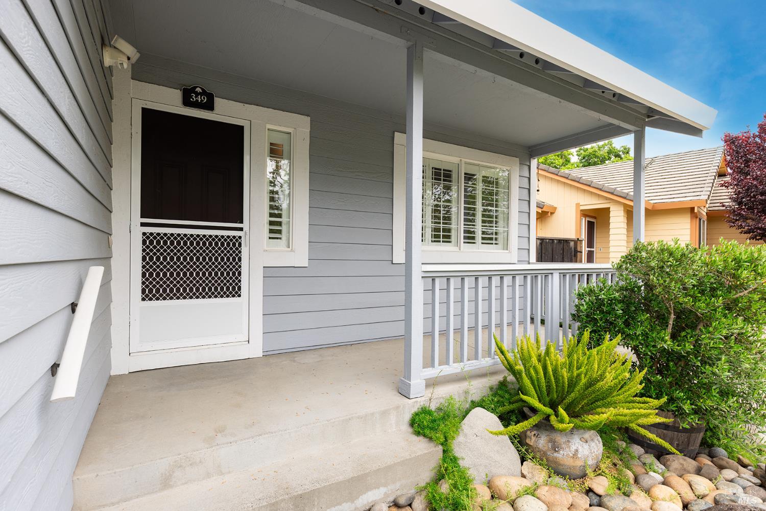 349 Sugar Maple Lane Windsor, CA 95492 - Photo 4 of 47 a view of front door and potted plants