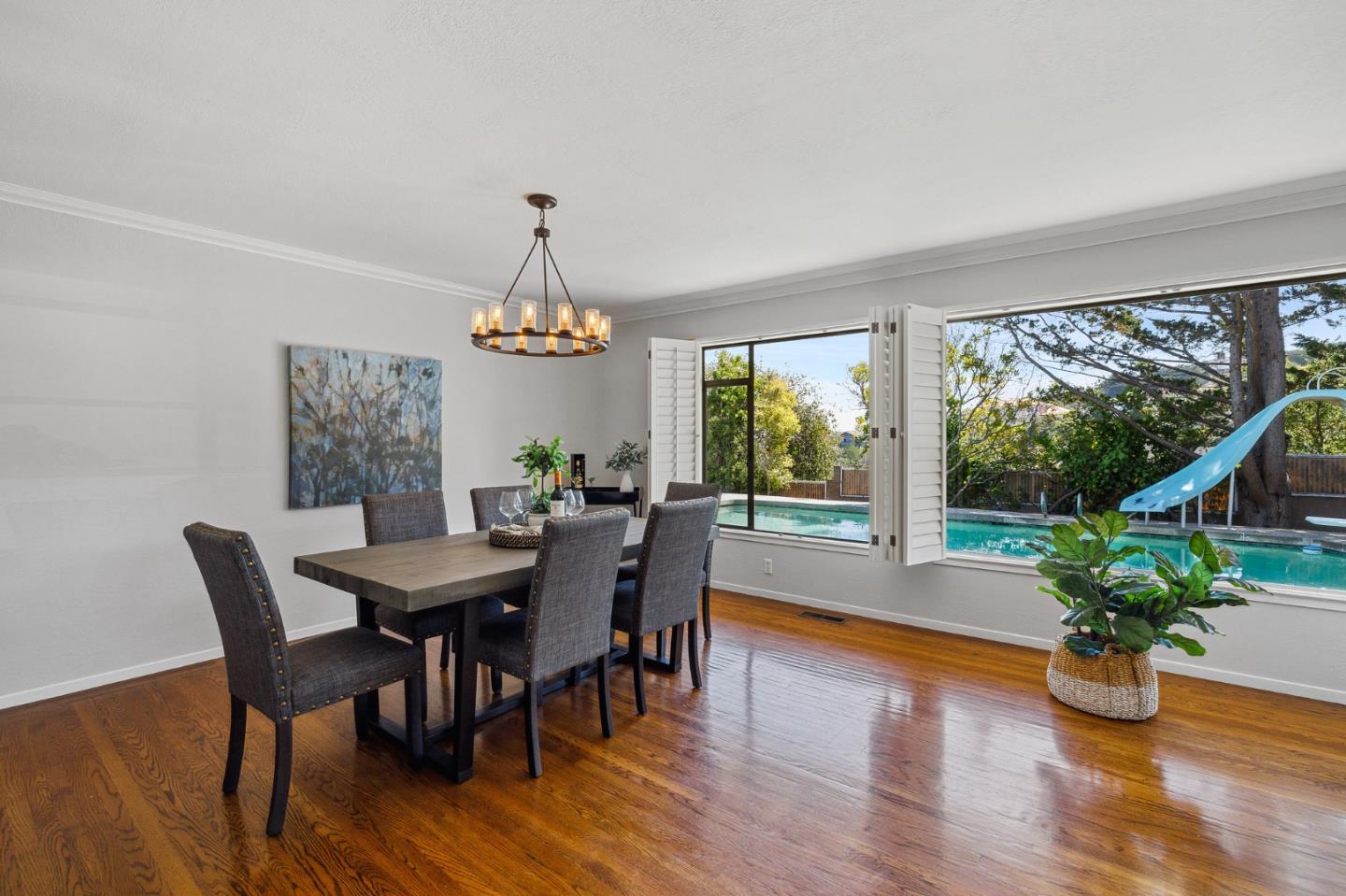 1245 Encina Drive Millbrae, CA 94030 - Photo 15 of 100 a view of a dining room with furniture window and wooden floor