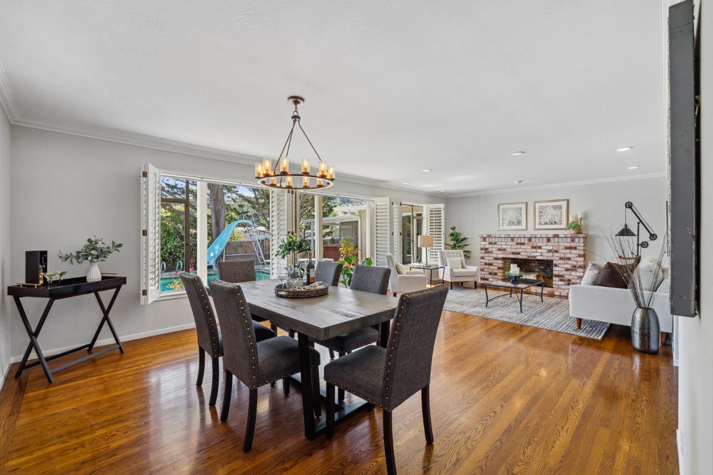 1245 Encina Drive Millbrae, CA 94030 - Photo 16 of 100 a view of a dining room with furniture wooden floor and chandelier
