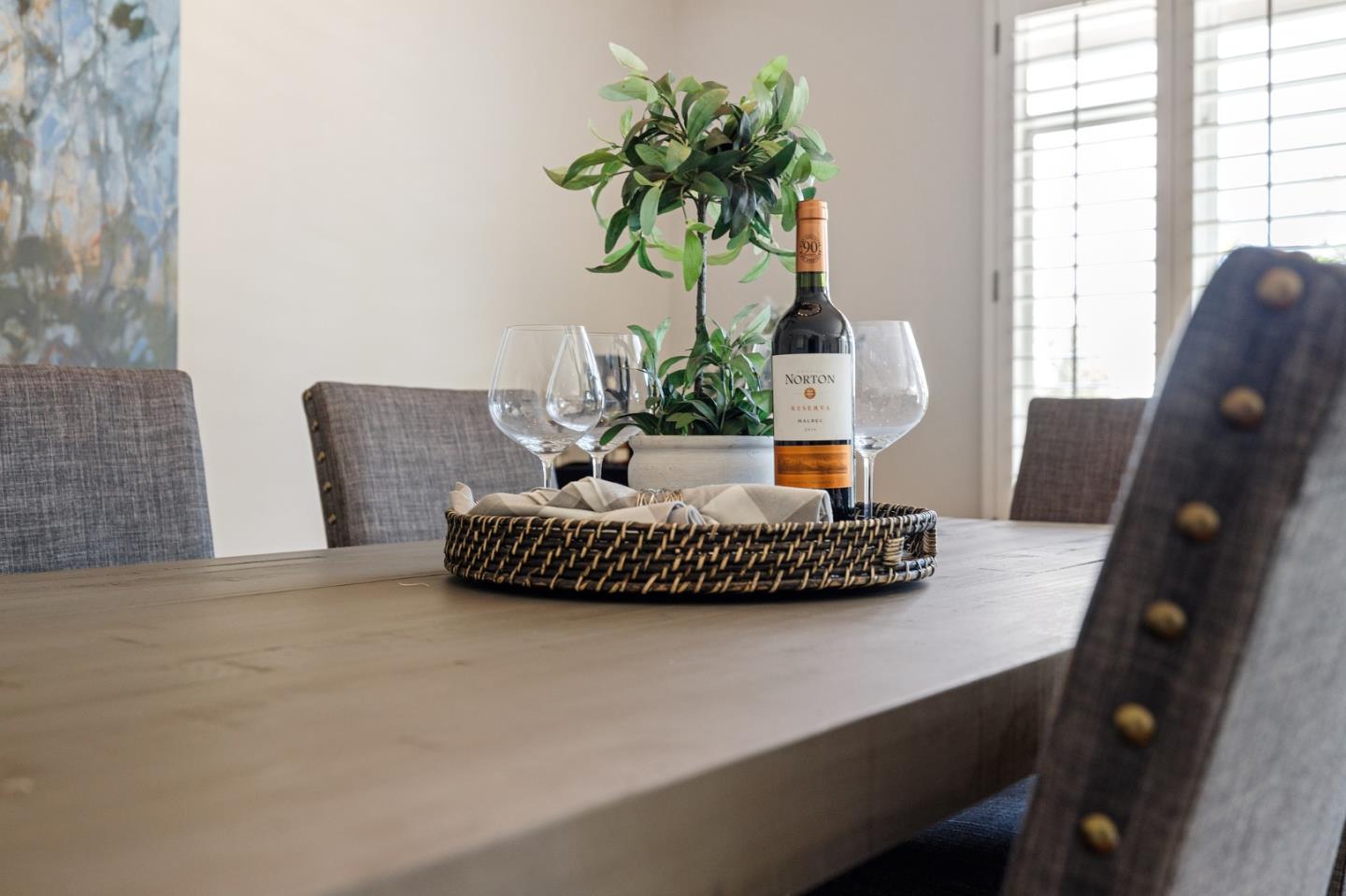 1245 Encina Drive Millbrae, CA 94030 - Photo 18 of 100 a living room with furniture and a potted plant