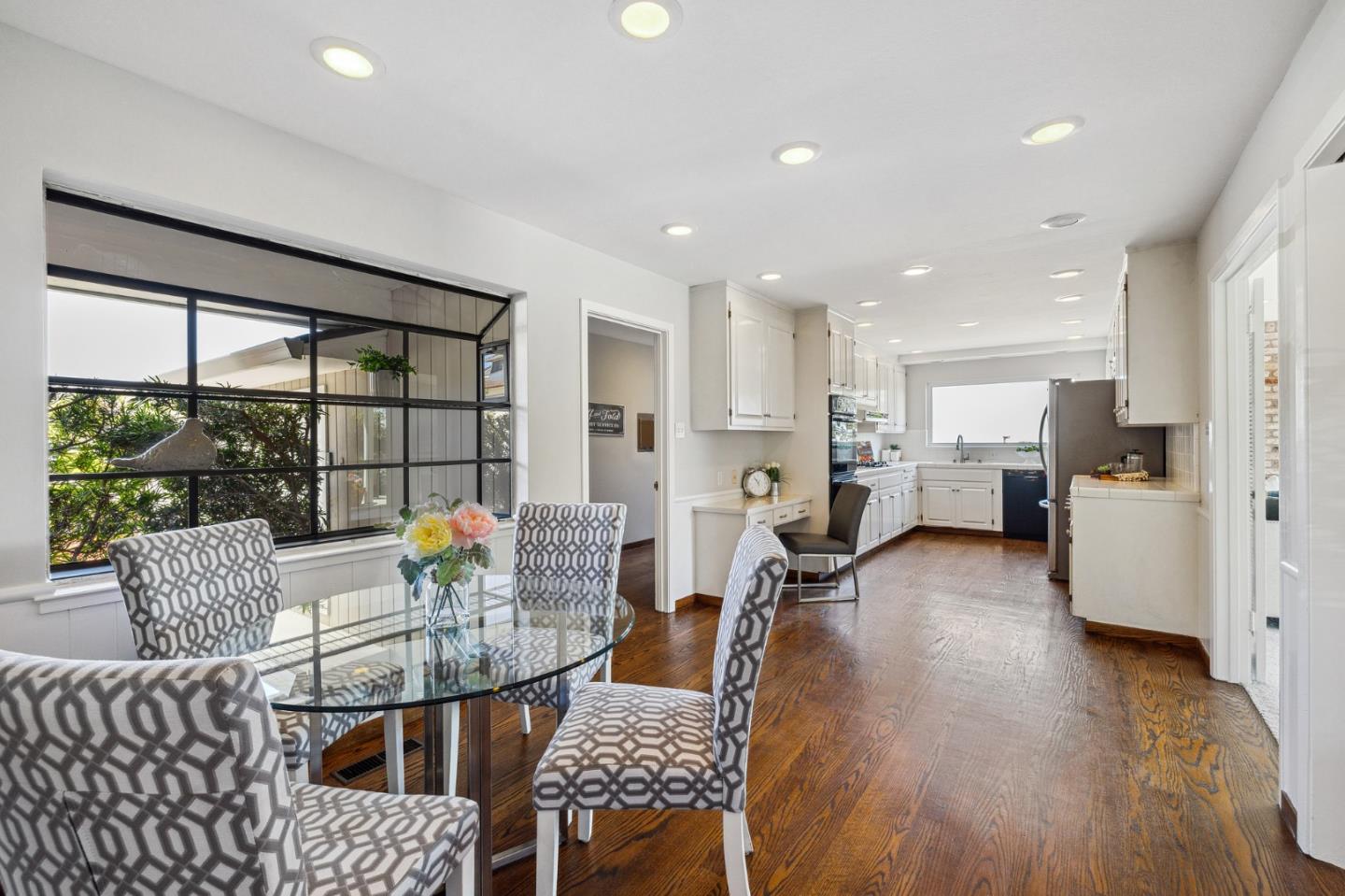 1245 Encina Drive Millbrae, CA 94030 - Photo 19 of 100 a living room with furniture and a table