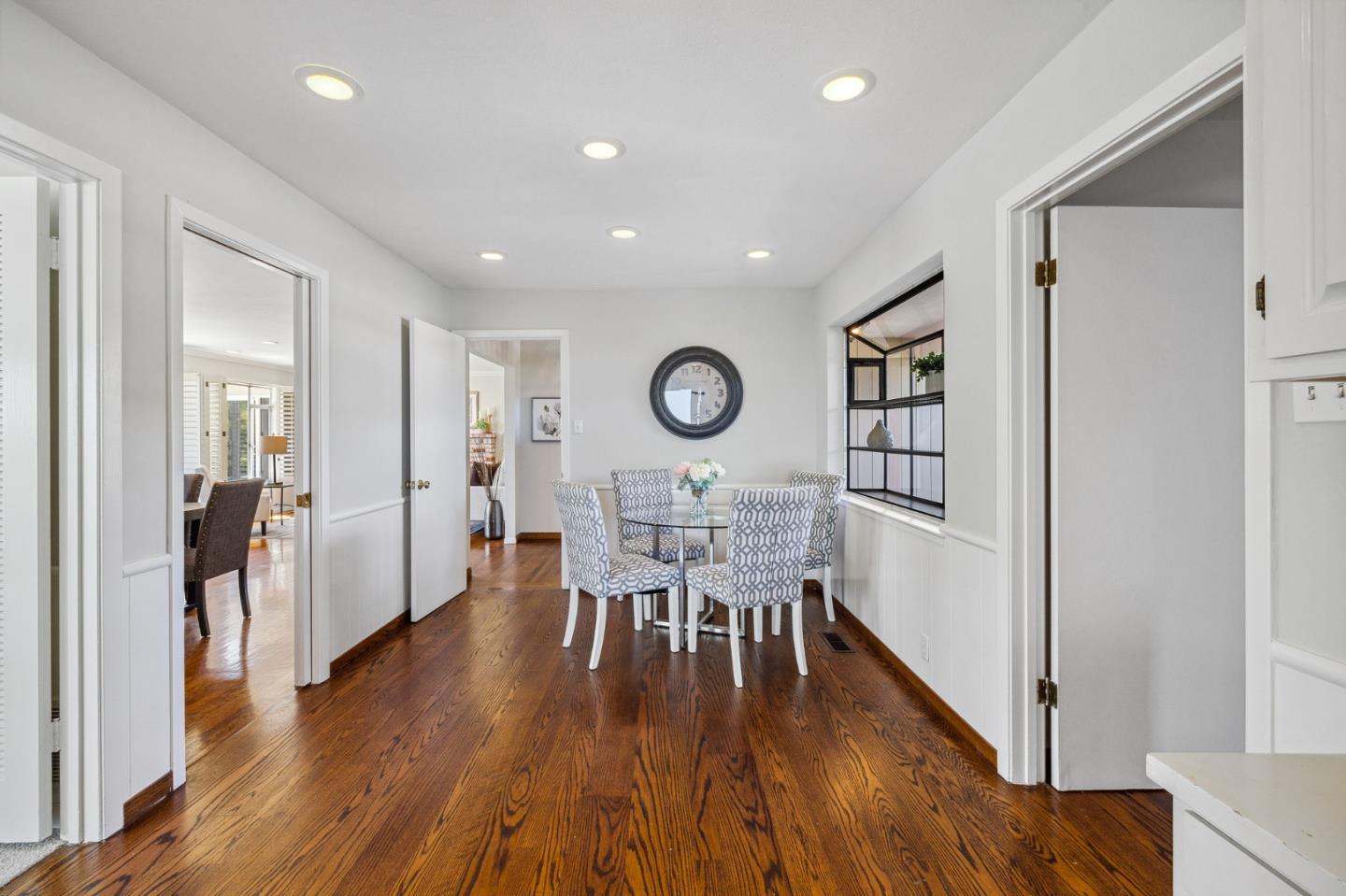 1245 Encina Drive Millbrae, CA 94030 - Photo 25 of 100 a view of a room with furniture and wooden floor