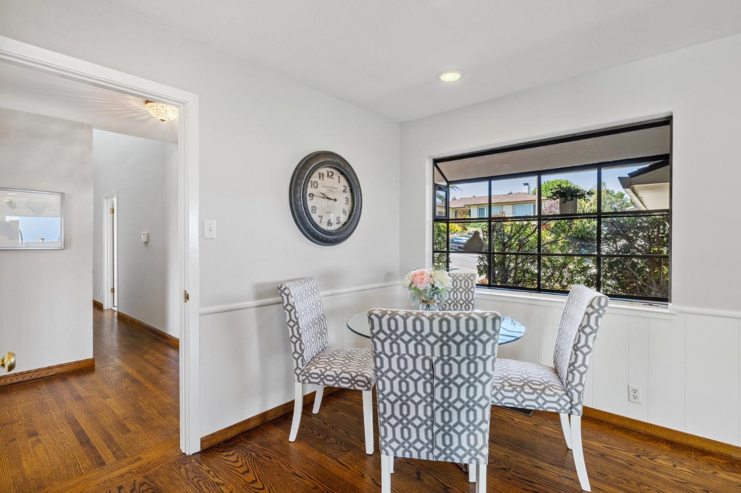 1245 Encina Drive Millbrae, CA 94030 - Photo 26 of 100 a view of a dining area with furniture window and wooden floor