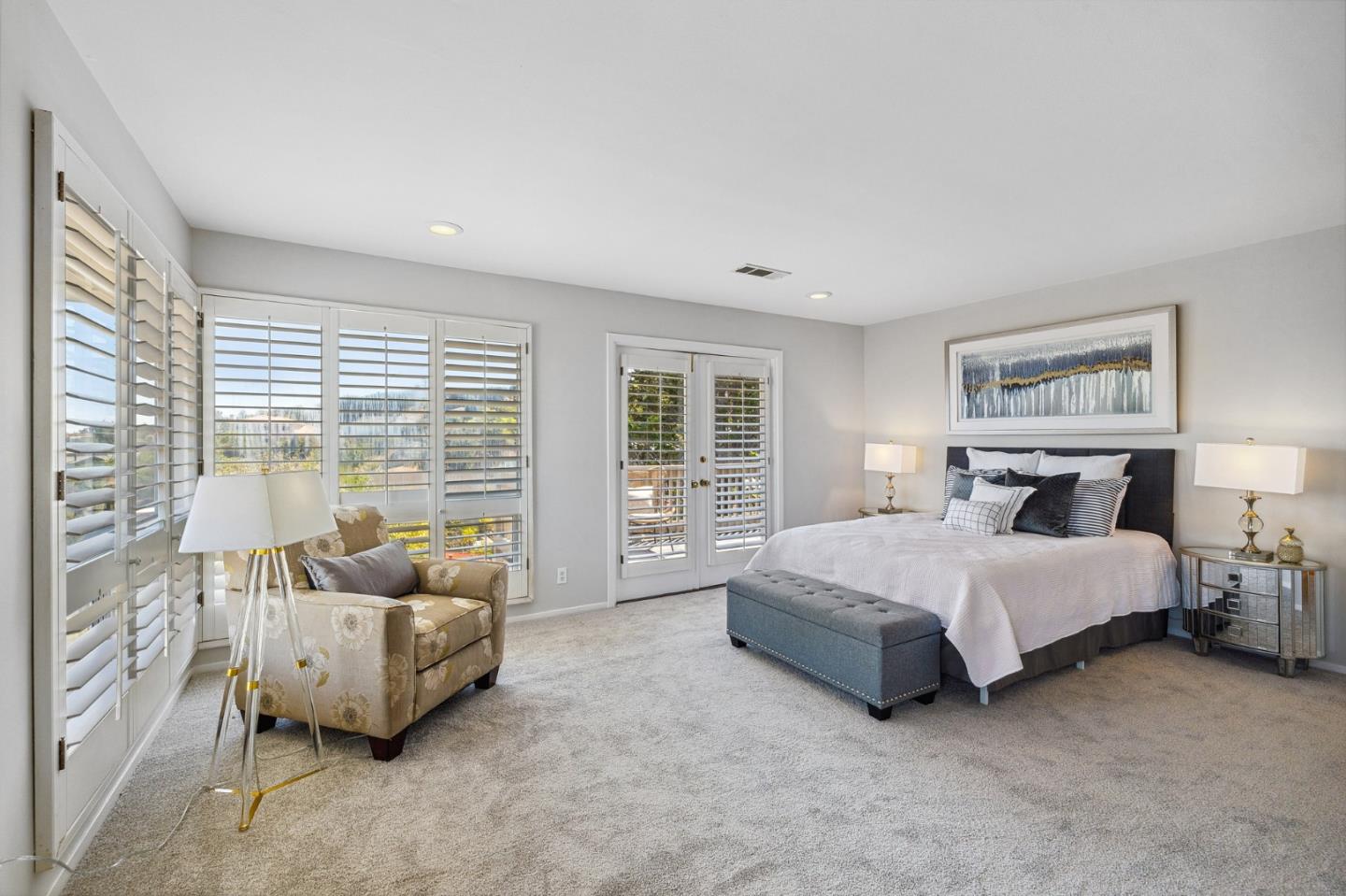 1245 Encina Drive Millbrae, CA 94030 - Photo 39 of 100 a spacious bedroom with a bed and glass window