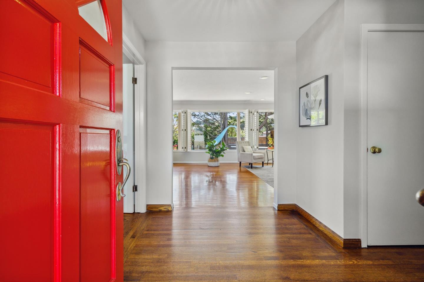 1245 Encina Drive Millbrae, CA 94030 - Photo 6 of 100 a view of an entryway with wooden floor and garden