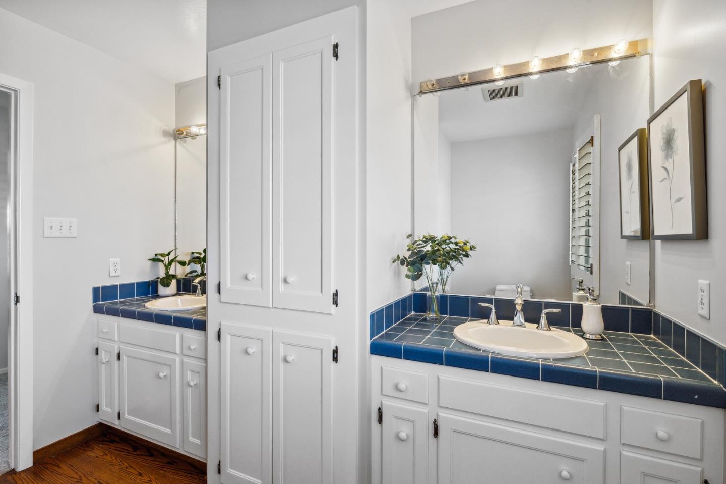 1245 Encina Drive Millbrae, CA 94030 - Photo 67 of 100 a bathroom with a granite countertop sink a mirror and a shower