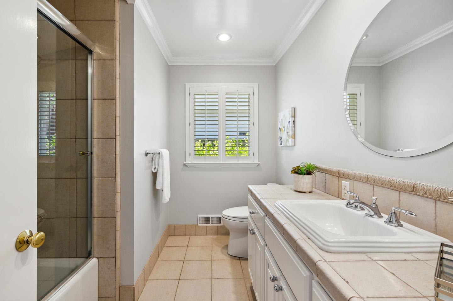 1245 Encina Drive Millbrae, CA 94030 - Photo 70 of 100 a bathroom with a sink a toilet and shower