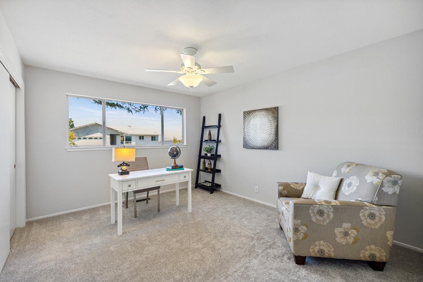 1245 Encina Drive Millbrae, CA 94030 - Photo 71 of 100 a living room with furniture and a window