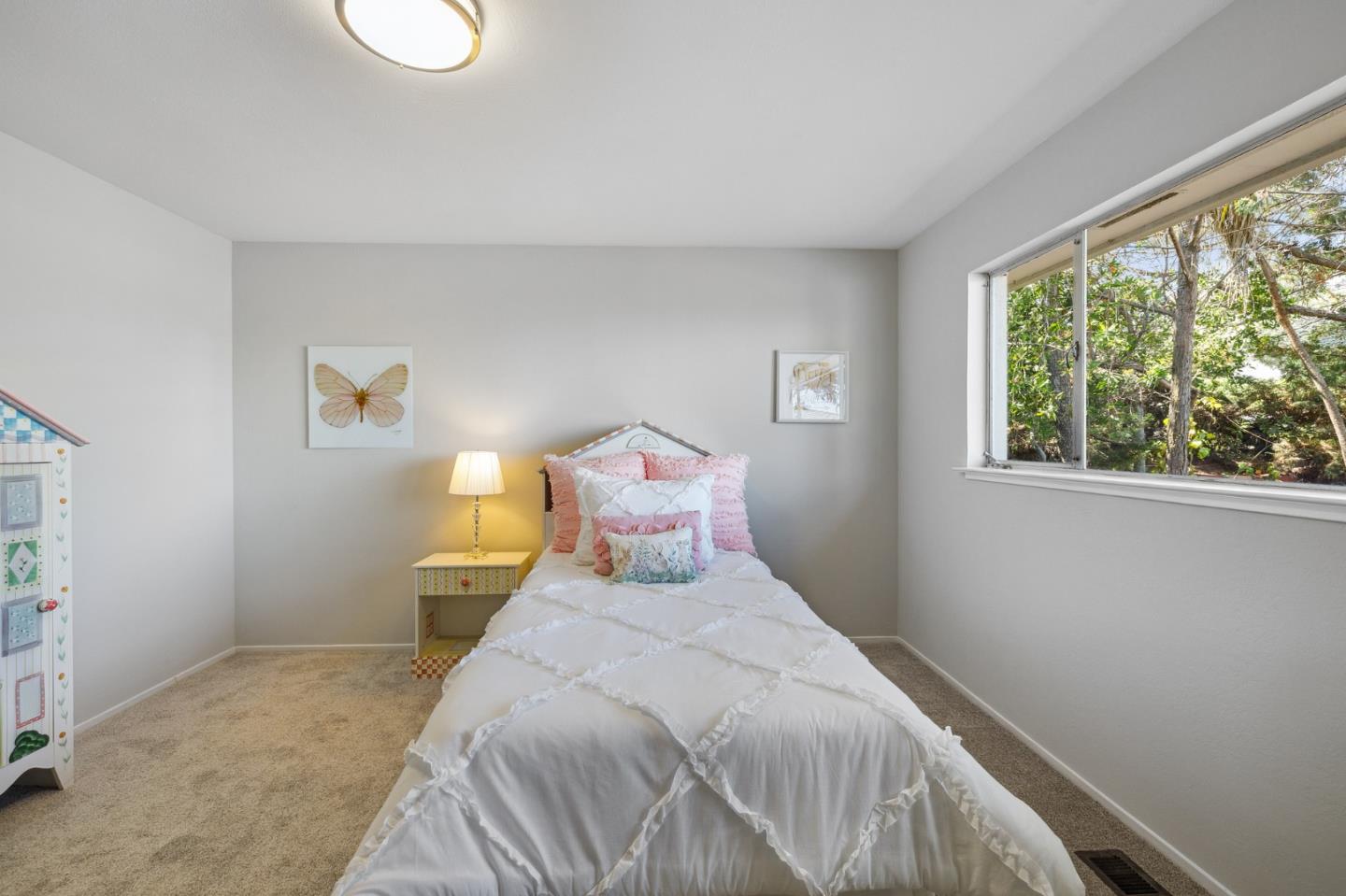 1245 Encina Drive Millbrae, CA 94030 - Photo 74 of 100 a bedroom with a bed and window