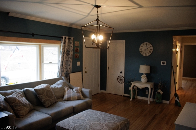 8 Millbrook Road Washington, NJ 07882 - Photo 4 of 24 a living room with furniture a window and wooden floor