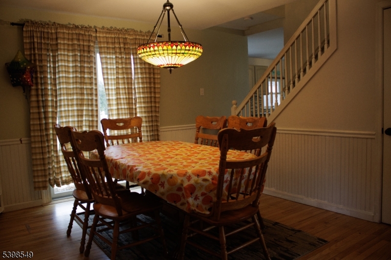 8 Millbrook Road Washington, NJ 07882 - Photo 8 of 24 a view of a dining room with furniture window and wooden floor