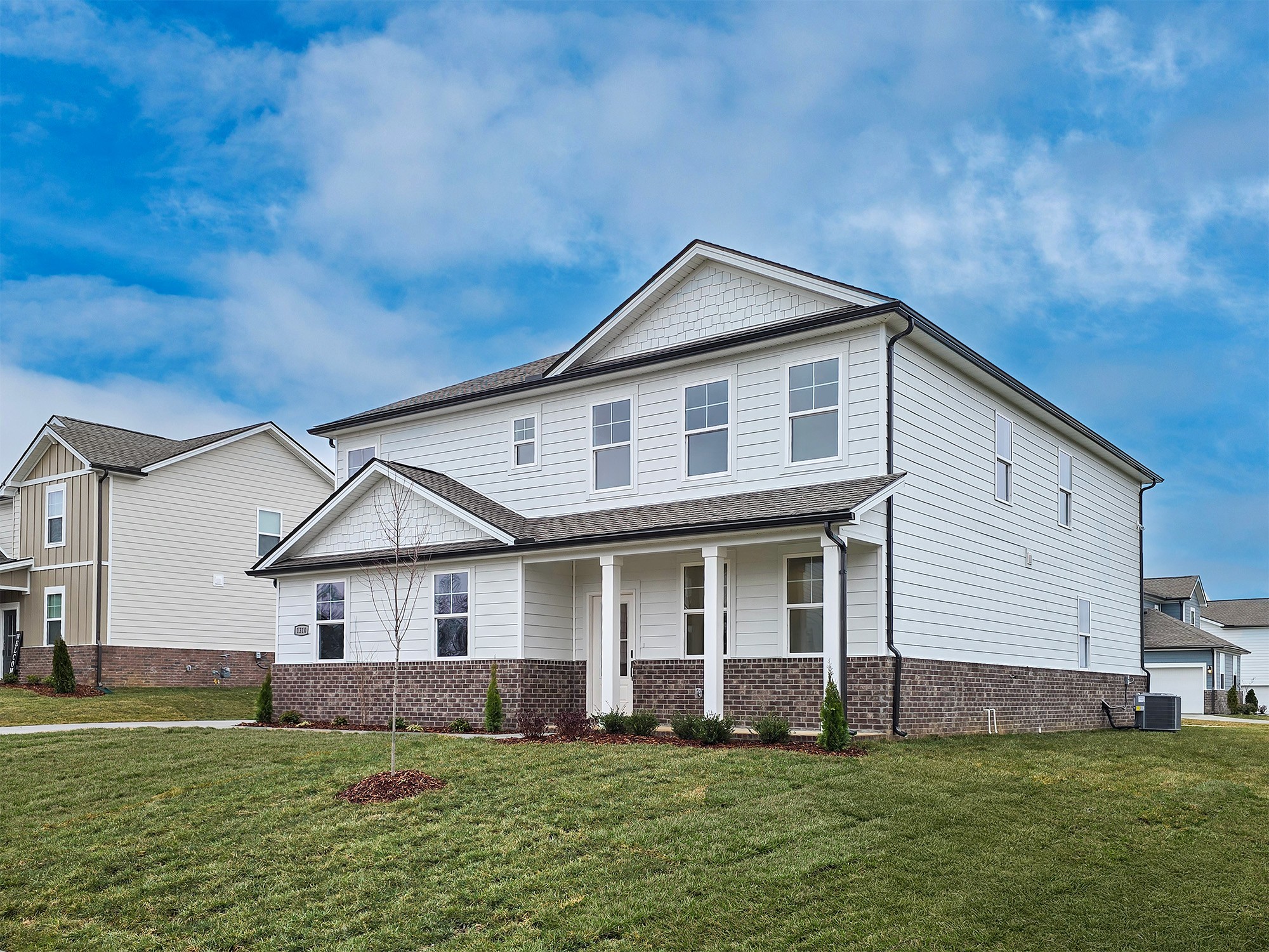1310 Kristopher Drive Lebanon, TN 37087 - Photo 2 of 36 a front view of a house with a yard