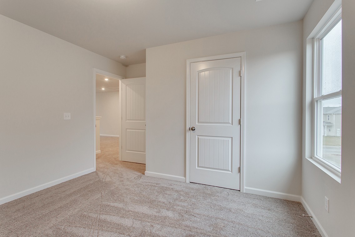 1310 Kristopher Drive Lebanon, TN 37087 - Photo 28 of 36 an empty room with windows and closet