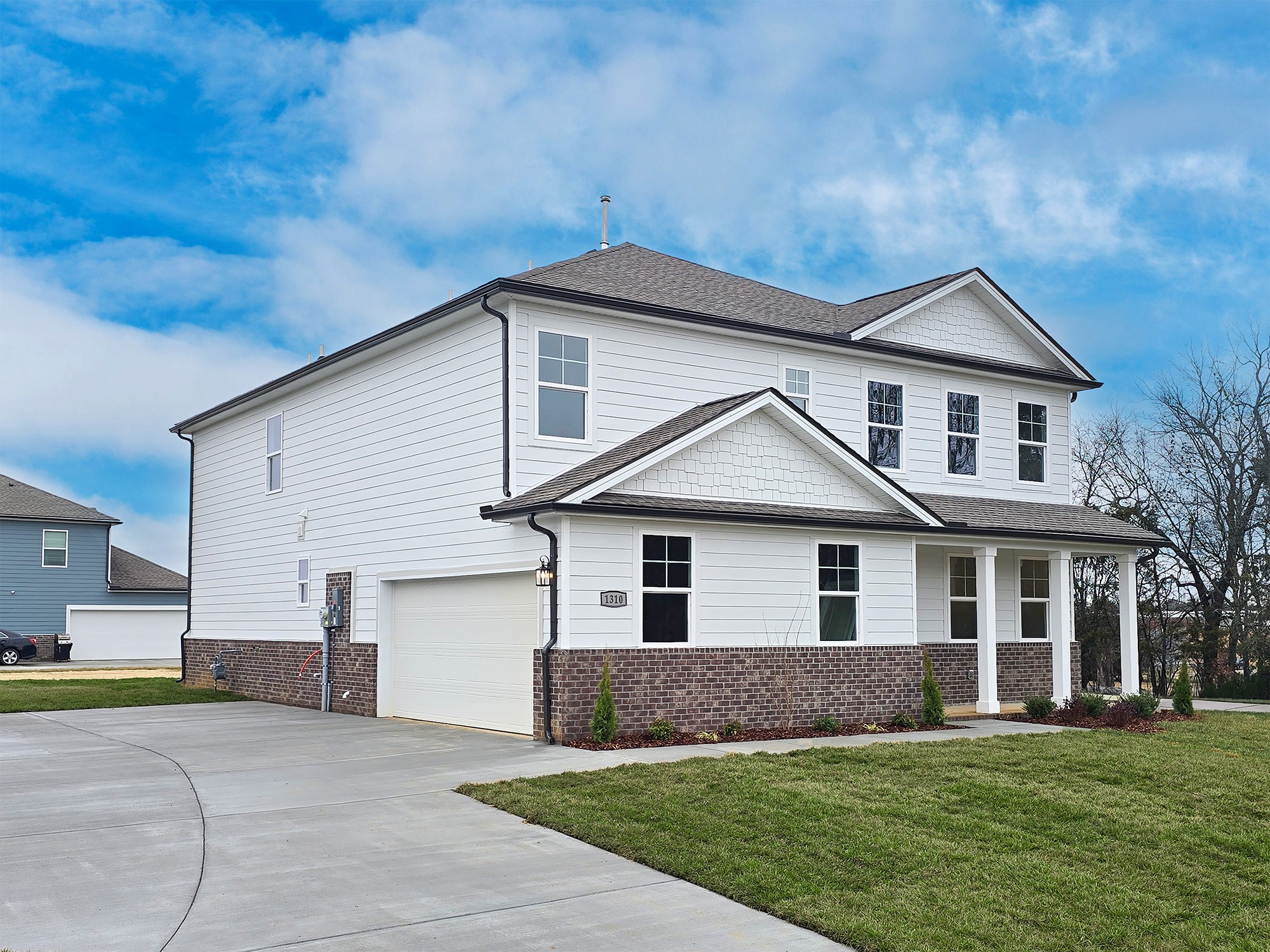 1310 Kristopher Drive Lebanon, TN 37087 - Photo 3 of 36 a front view of a house with a yard