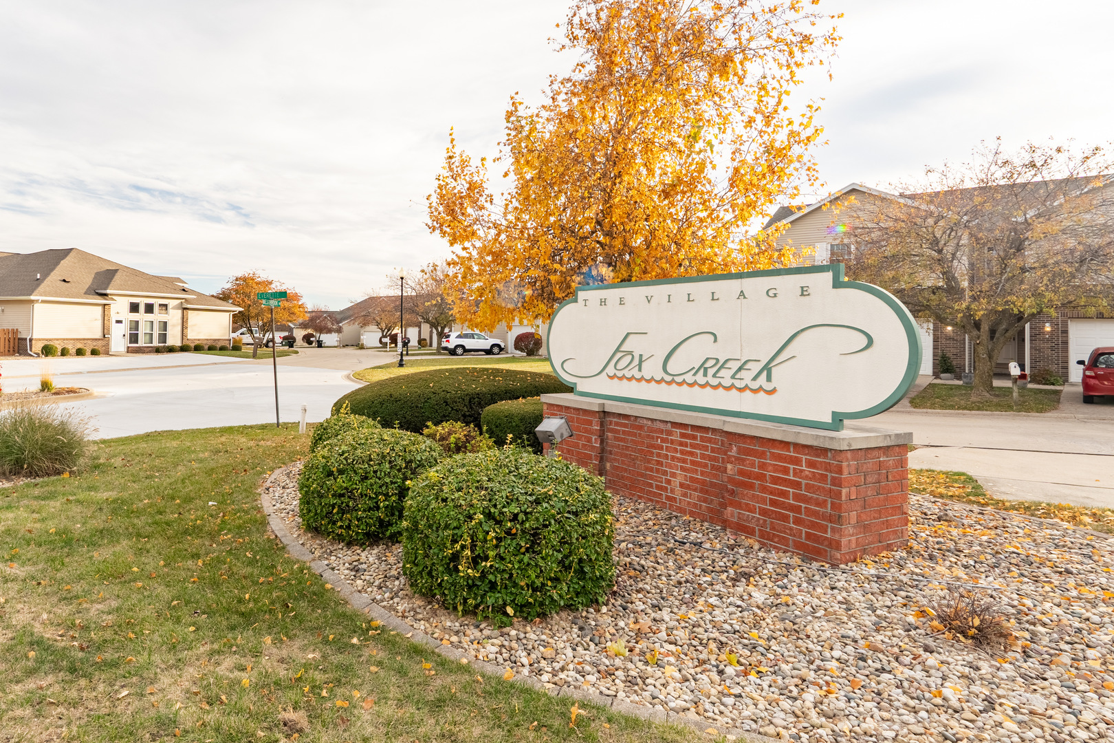 a sign board with parking space