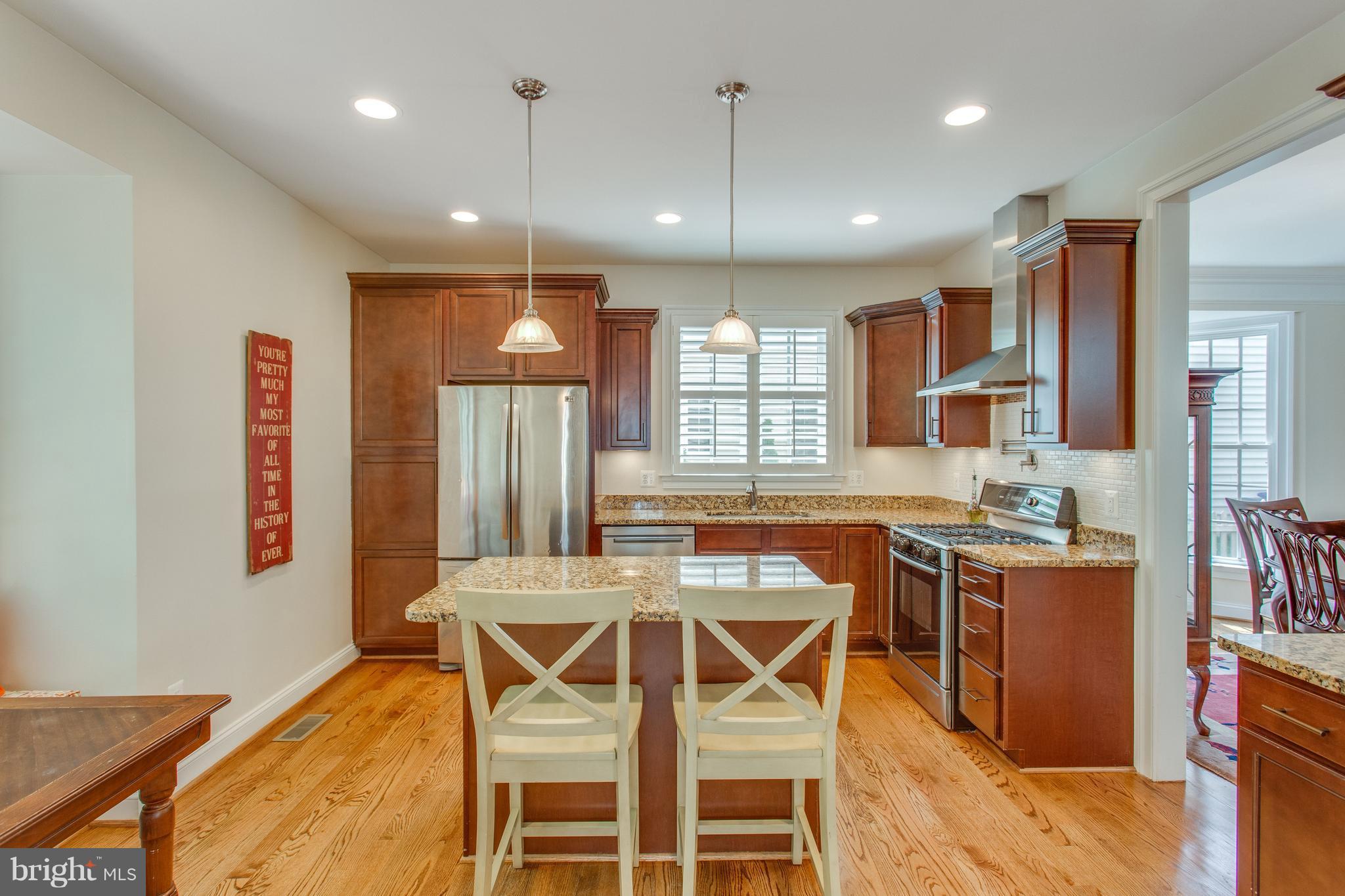 8037 Washington Road Alexandria, VA 22308 - Photo 12 of 30 Chef's kitchen with island and breakfast bar