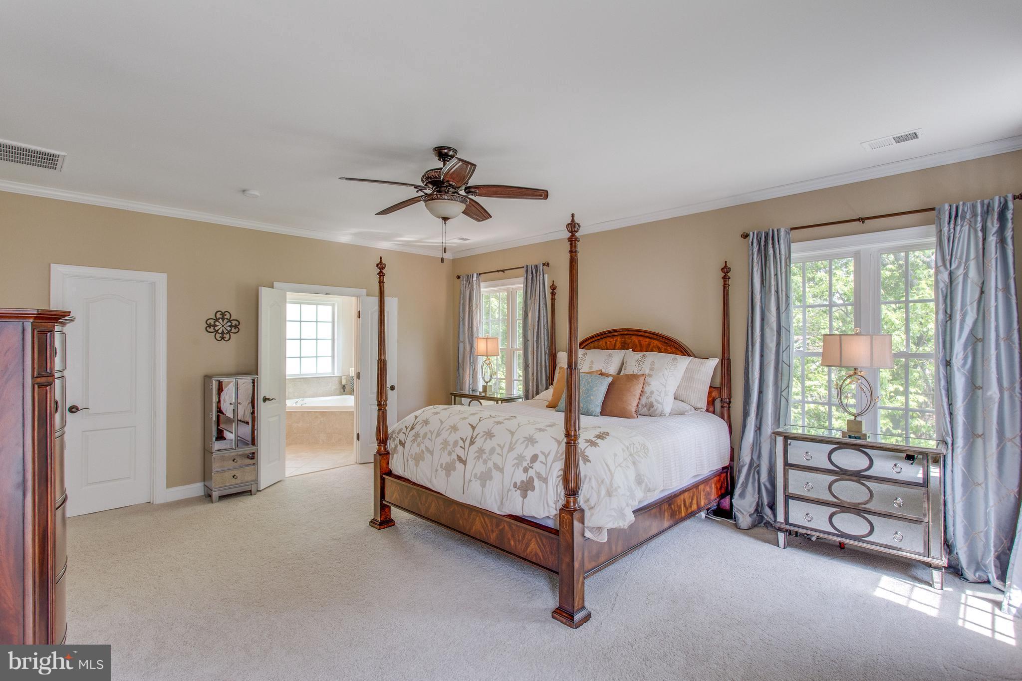 8037 Washington Road Alexandria, VA 22308 - Photo 14 of 30 Master suite with walk-in closet and attached bath