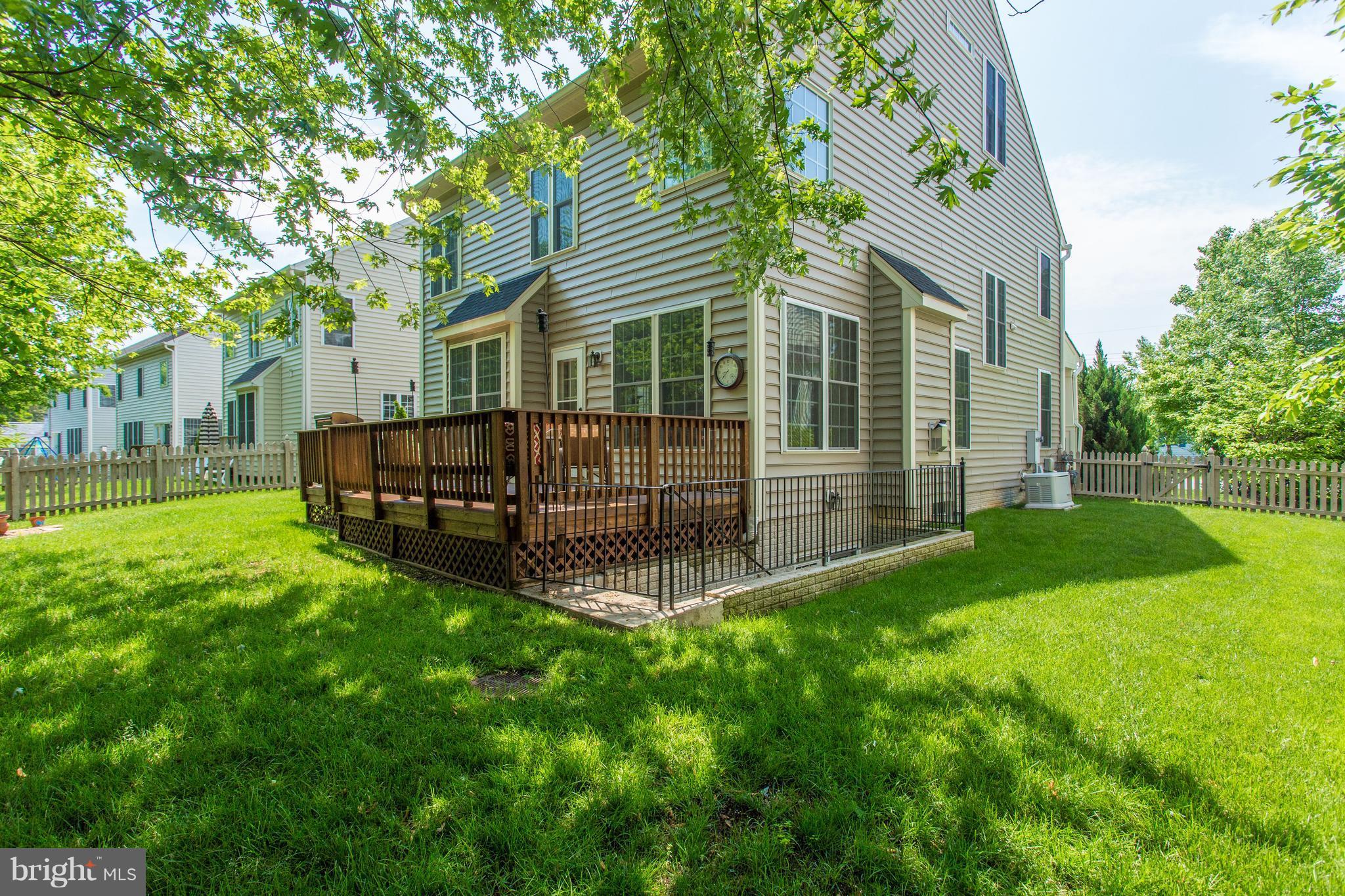 8037 Washington Road Alexandria, VA 22308 - Photo 27 of 30 Rear deck and manicured lawn