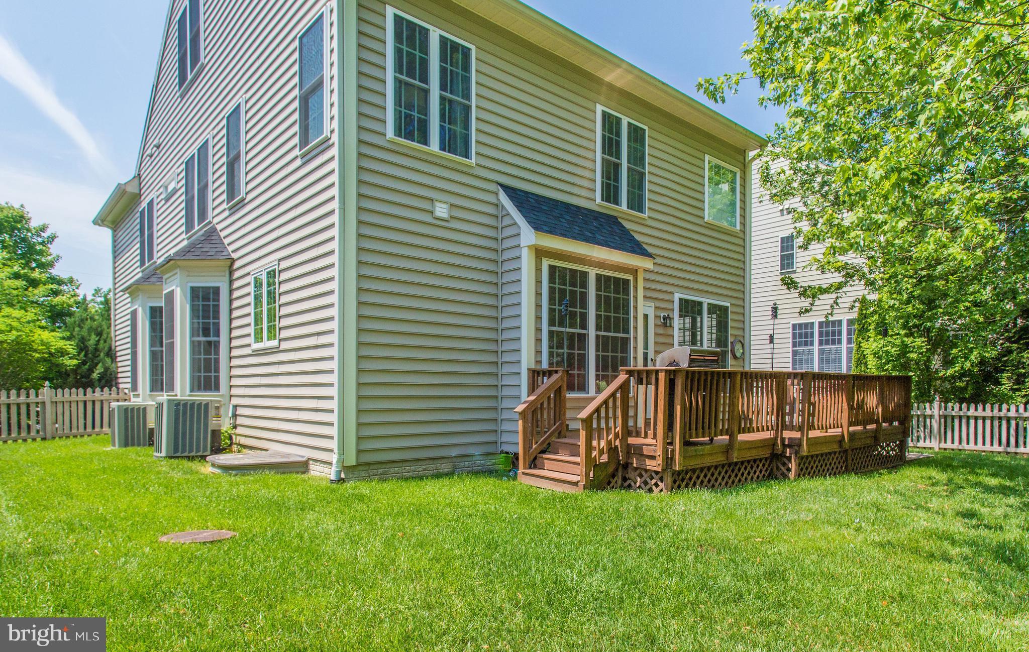 8037 Washington Road Alexandria, VA 22308 - Photo 29 of 30 Fully fenced backyard and lush lawn