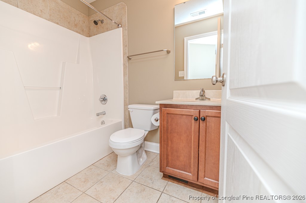 255 Trenton Place Cameron, NC 28326 - Photo 22 of 49 a bathroom with a sink a toilet and shower