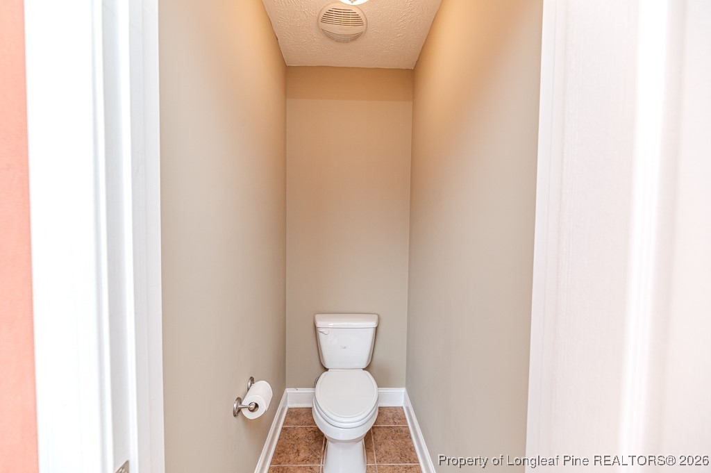 255 Trenton Place Cameron, NC 28326 - Photo 27 of 49 a bathroom with a toilet