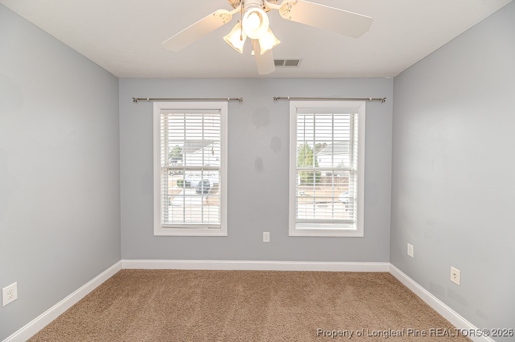 255 Trenton Place Cameron, NC 28326 - Photo 32 of 49 a view of an empty room with a window