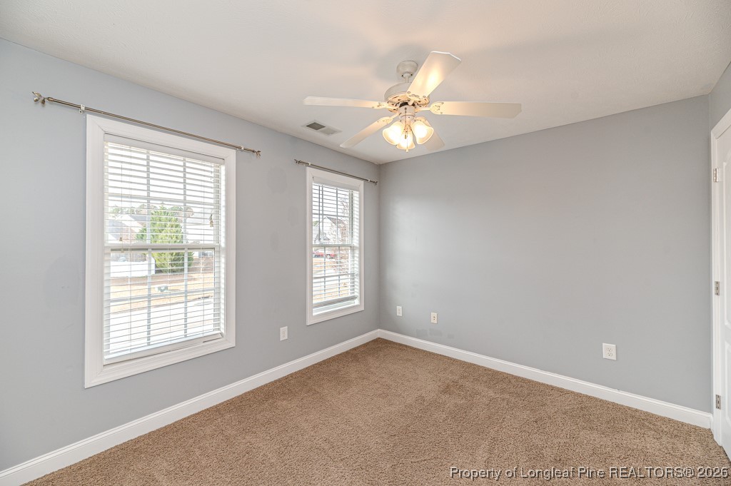 255 Trenton Place Cameron, NC 28326 - Photo 33 of 49 a view of an empty room with a window