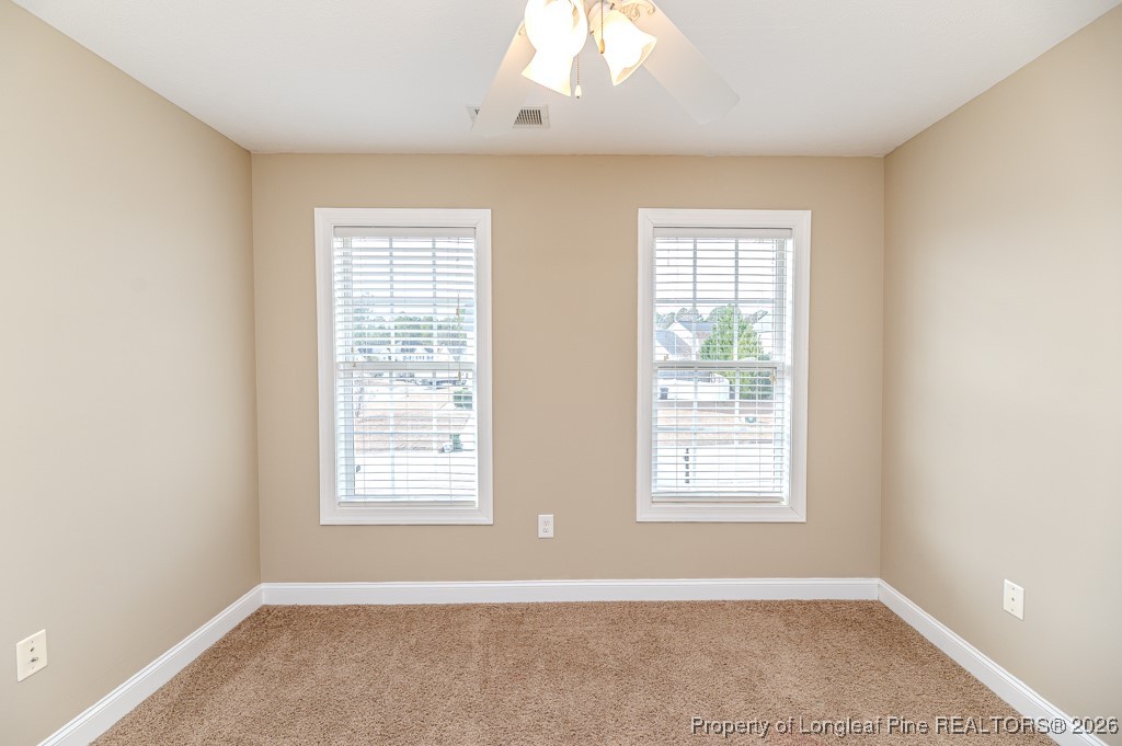 255 Trenton Place Cameron, NC 28326 - Photo 34 of 49 a view of an empty room with a window